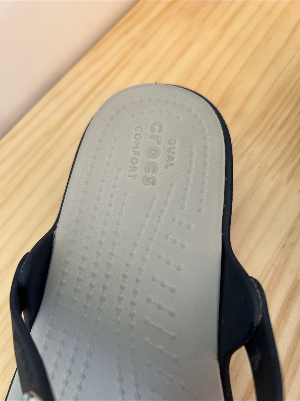 Crocs sandal in navy blue with blue, teal, and white detailing. - Picture 3 of 5